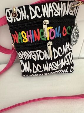 Robin Ruth Black Crossbody Bag with Multicolor Script and Pink Strap